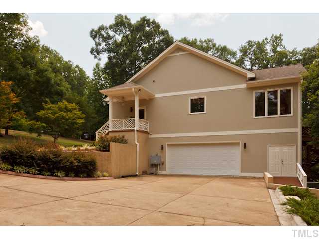 7716 Senter Farm Road Apex, NC 27539 - Photo 23 of 25 Second view of the main garage, which provides extra storage. Additional storage is located in the 1500 square foot floored attic.