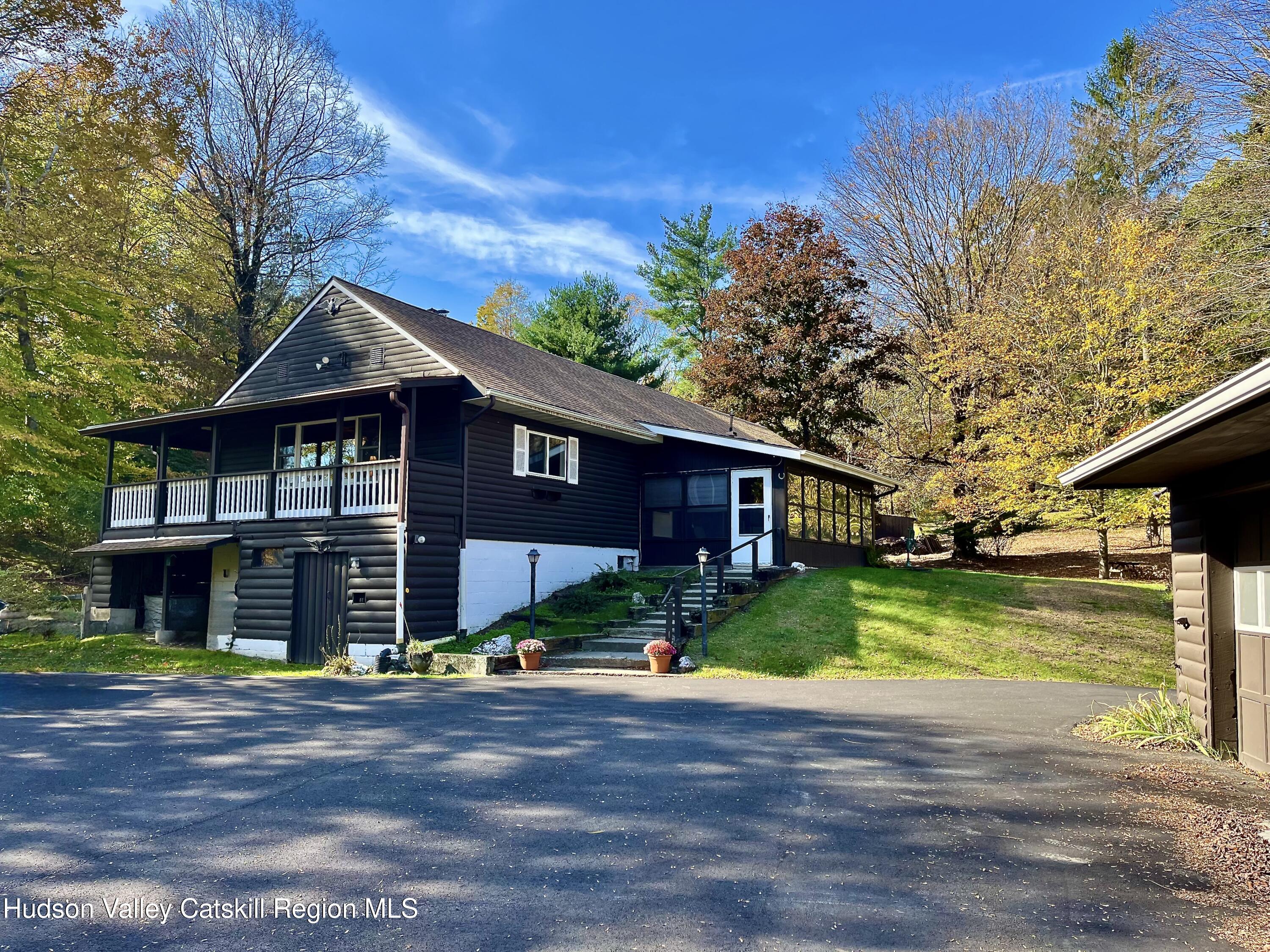 59 New Forge Rd I Ancram, NY 12502 - Photo 1 of 32 a front view of house with yard and green space