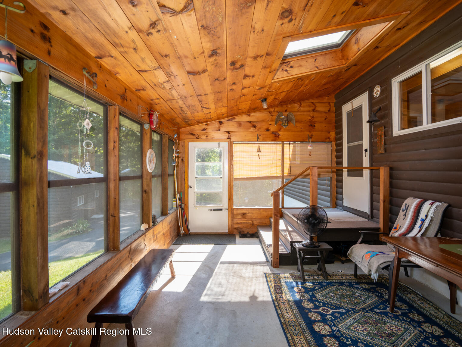 59 New Forge Rd I Ancram, NY 12502 - Photo 19 of 32 a balcony with furniture and a potted plant
