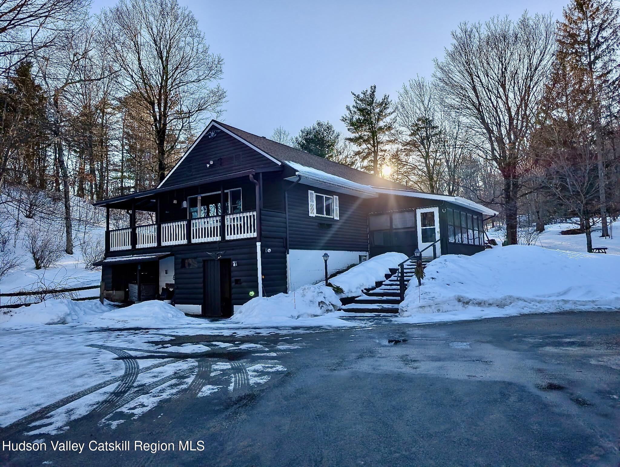59 New Forge Rd I Ancram, NY 12502 - Photo 2 of 32 a view of a house with a yard covered in snow