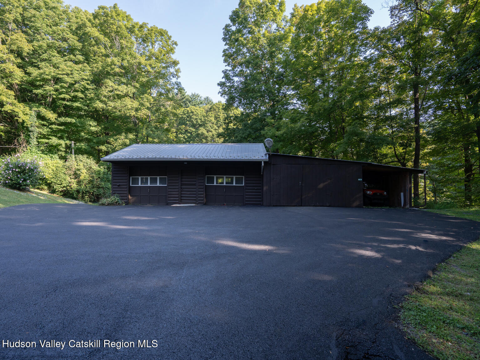 59 New Forge Rd I Ancram, NY 12502 - Photo 8 of 32 a front view of a house with a yard and tree s