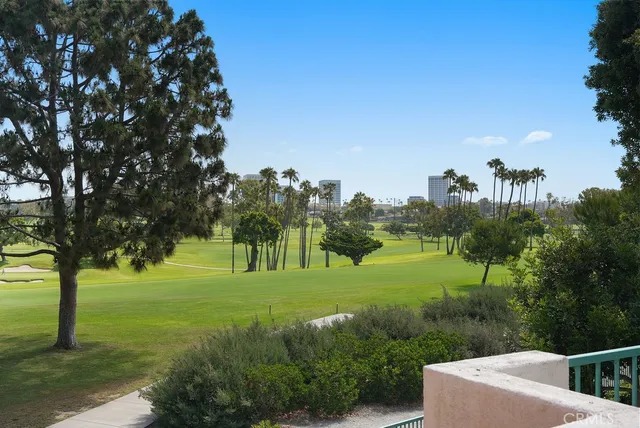 a kitchen with sink a microwave and stove