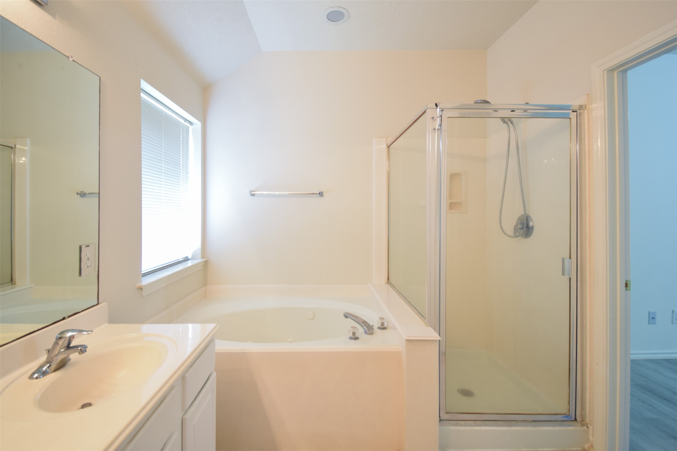 21315 Pepperberry Trail Spring, TX 77388 - Photo 12 of 21 a bathroom with a shower a sink and a mirror