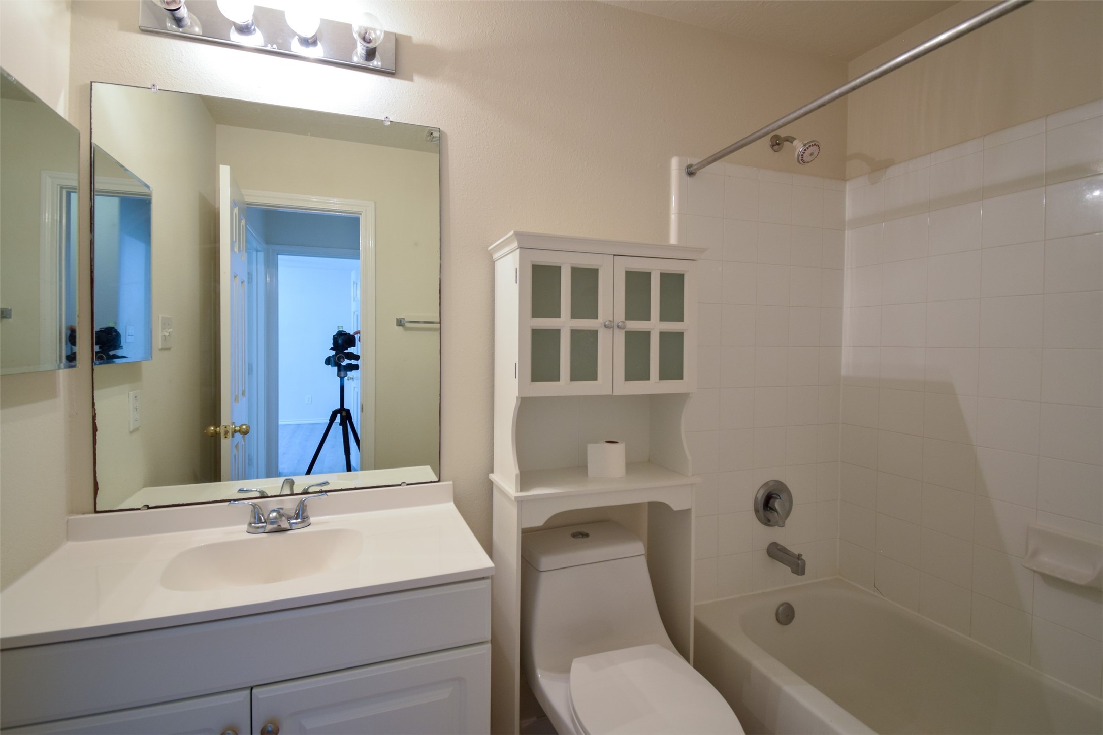 21315 Pepperberry Trail Spring, TX 77388 - Photo 18 of 21 a bathroom with a sink a toilet and a bathtub