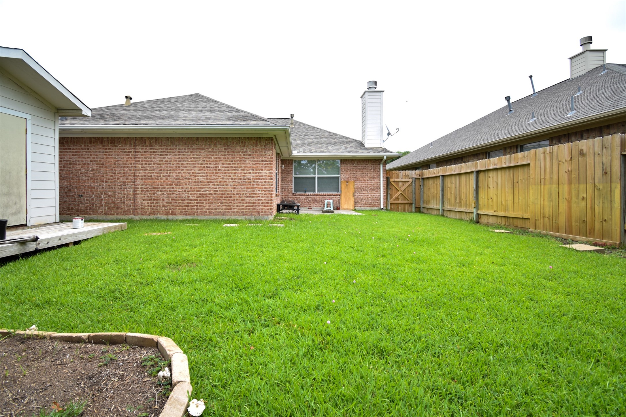 21315 Pepperberry Trail Spring, TX 77388 - Photo 21 of 21 a front view of a house with a yard and garage