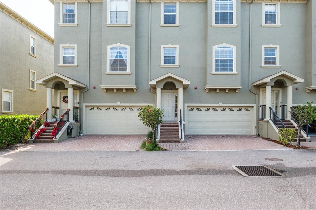 10220 Bayou Grande Seminole, FL 33772 - Photo 2 of 50 a view of a house with many windows and a yard