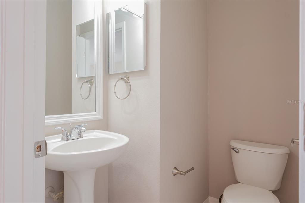 10220 Bayou Grande Seminole, FL 33772 - Photo 25 of 50 a bathroom with a sink toilet and a mirror