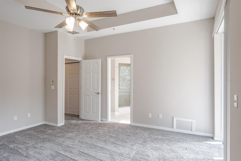 10220 Bayou Grande Seminole, FL 33772 - Photo 28 of 50 an empty room with windows and fan