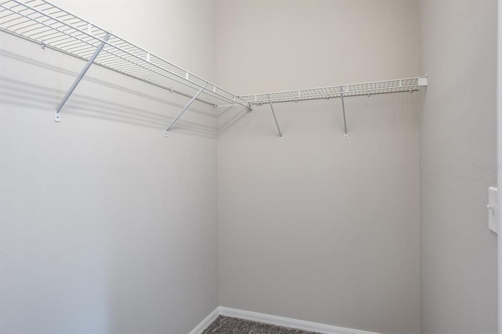 10220 Bayou Grande Seminole, FL 33772 - Photo 33 of 50 a view of a room with racks on the wall