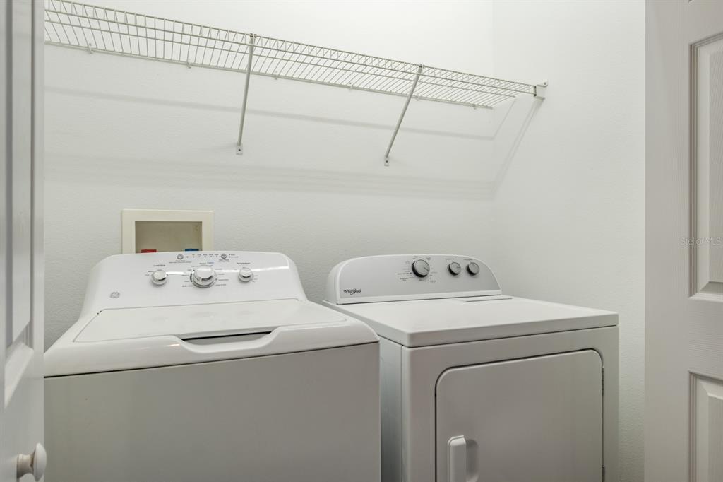 10220 Bayou Grande Seminole, FL 33772 - Photo 46 of 50 a utility room with dryer and washer