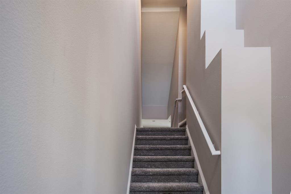 10220 Bayou Grande Seminole, FL 33772 - Photo 6 of 50 a view of staircase with wooden floor