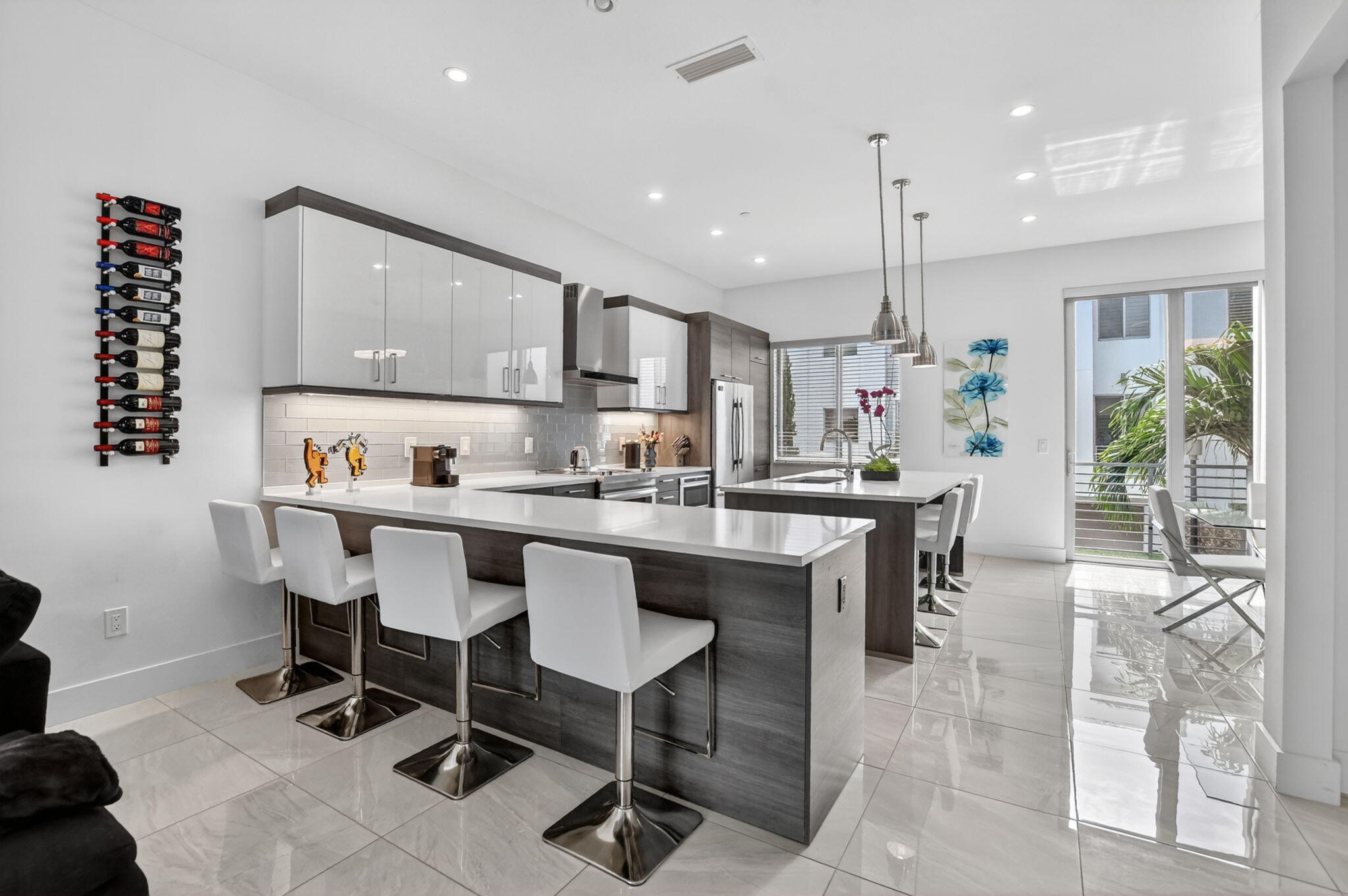 4021 Northwest 18th Way Boca Raton, FL 33431 - Photo 10 of 37 a kitchen with a table and chairs