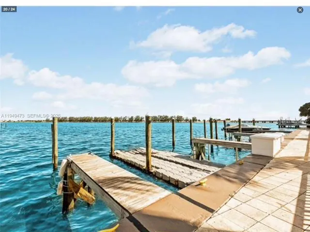 a view of a balcony with lake view and a ocean view