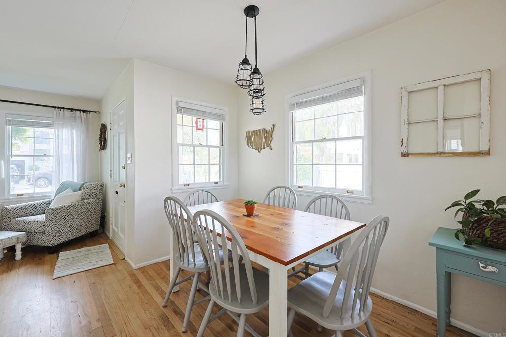 417 5th Street Coronado, CA 92118 - Photo 2 of 46 a view of a dining room with furniture window and wooden floor