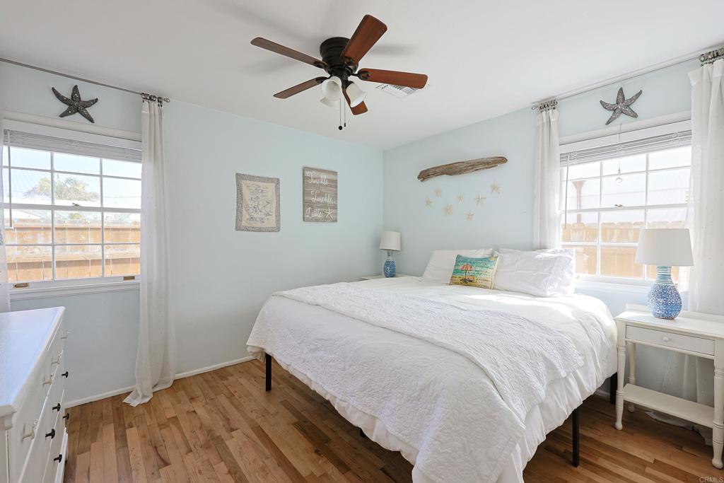 417 5th Street Coronado, CA 92118 - Photo 21 of 46 a bedroom with a bed and a window