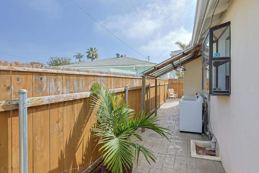 417 5th Street Coronado, CA 92118 - Photo 27 of 46 a view of a balcony with wooden floor and door