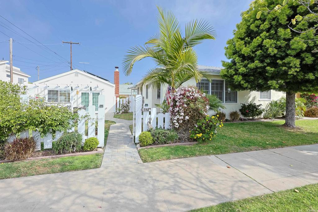 417 5th Street Coronado, CA 92118 - Photo 46 of 46 a front view of house with yard and green space