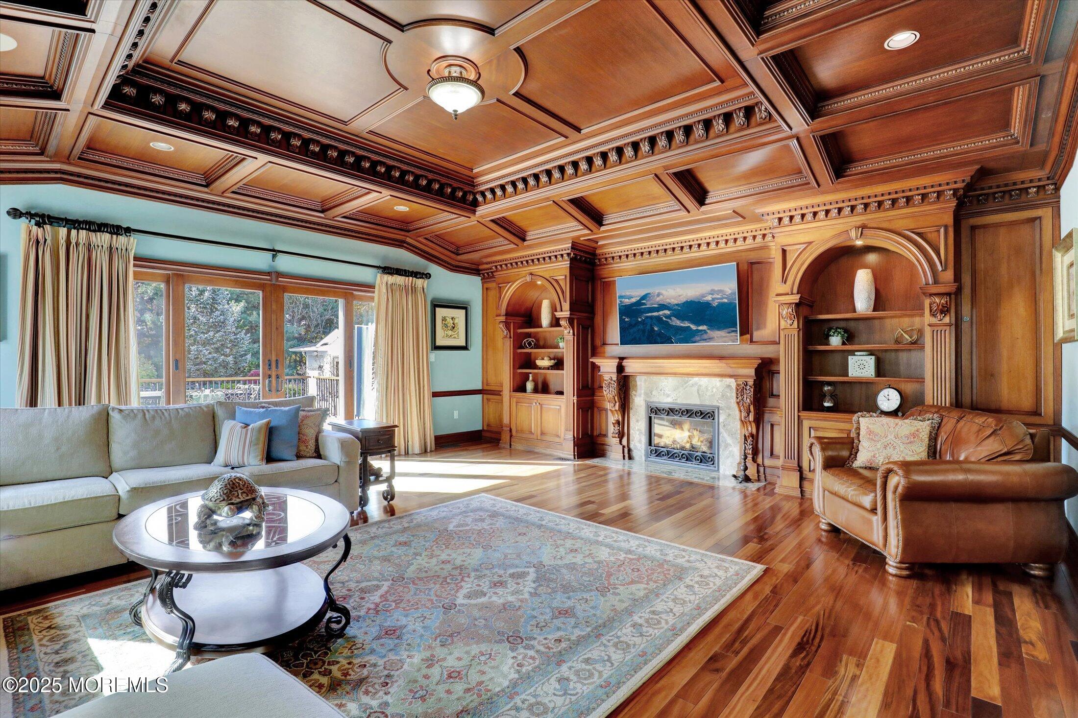 10 Yellow Brook Road Holmdel, NJ 07733 - Photo 16 of 64 a living room with furniture and a fireplace