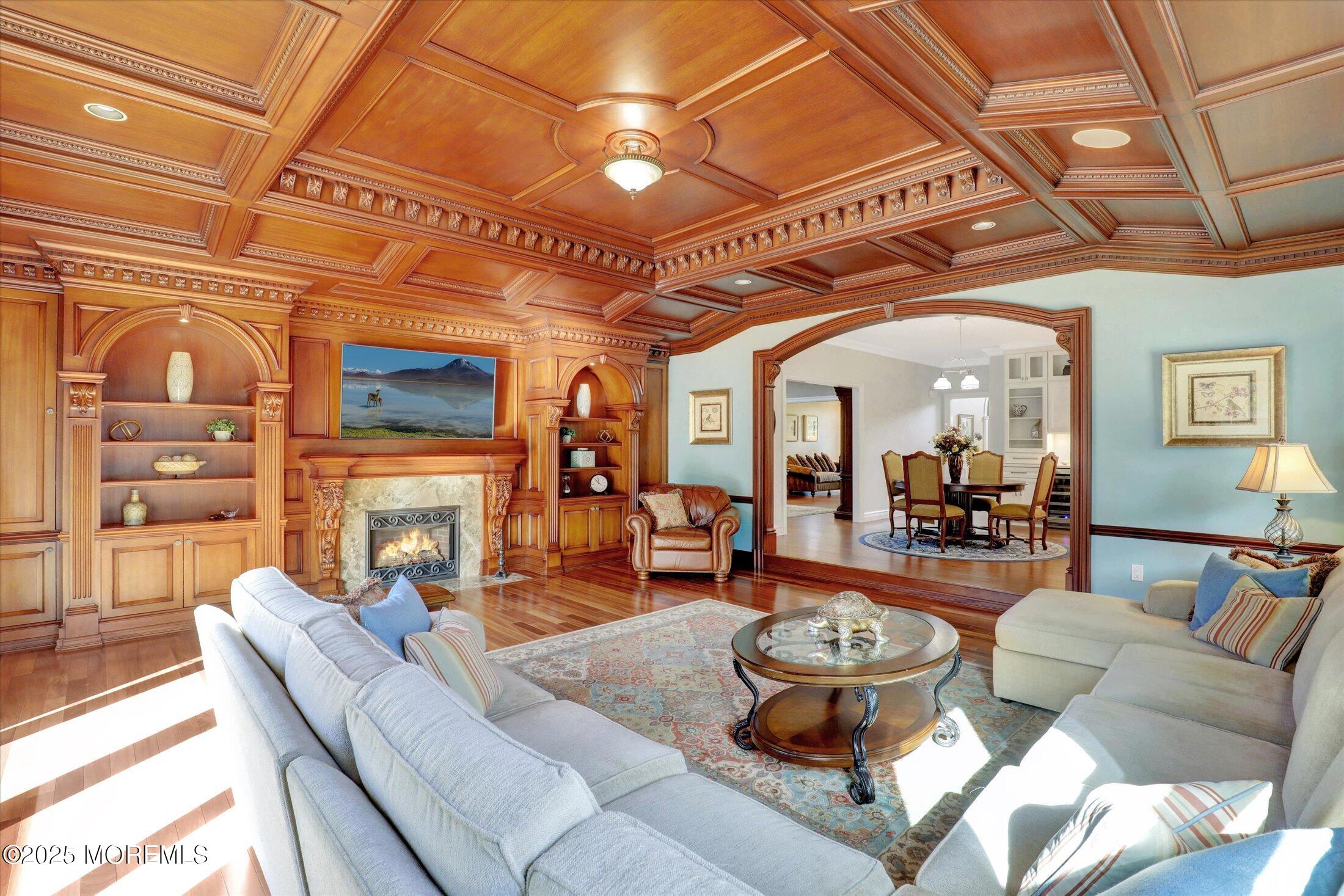 10 Yellow Brook Road Holmdel, NJ 07733 - Photo 19 of 64 a living room with furniture and a fireplace