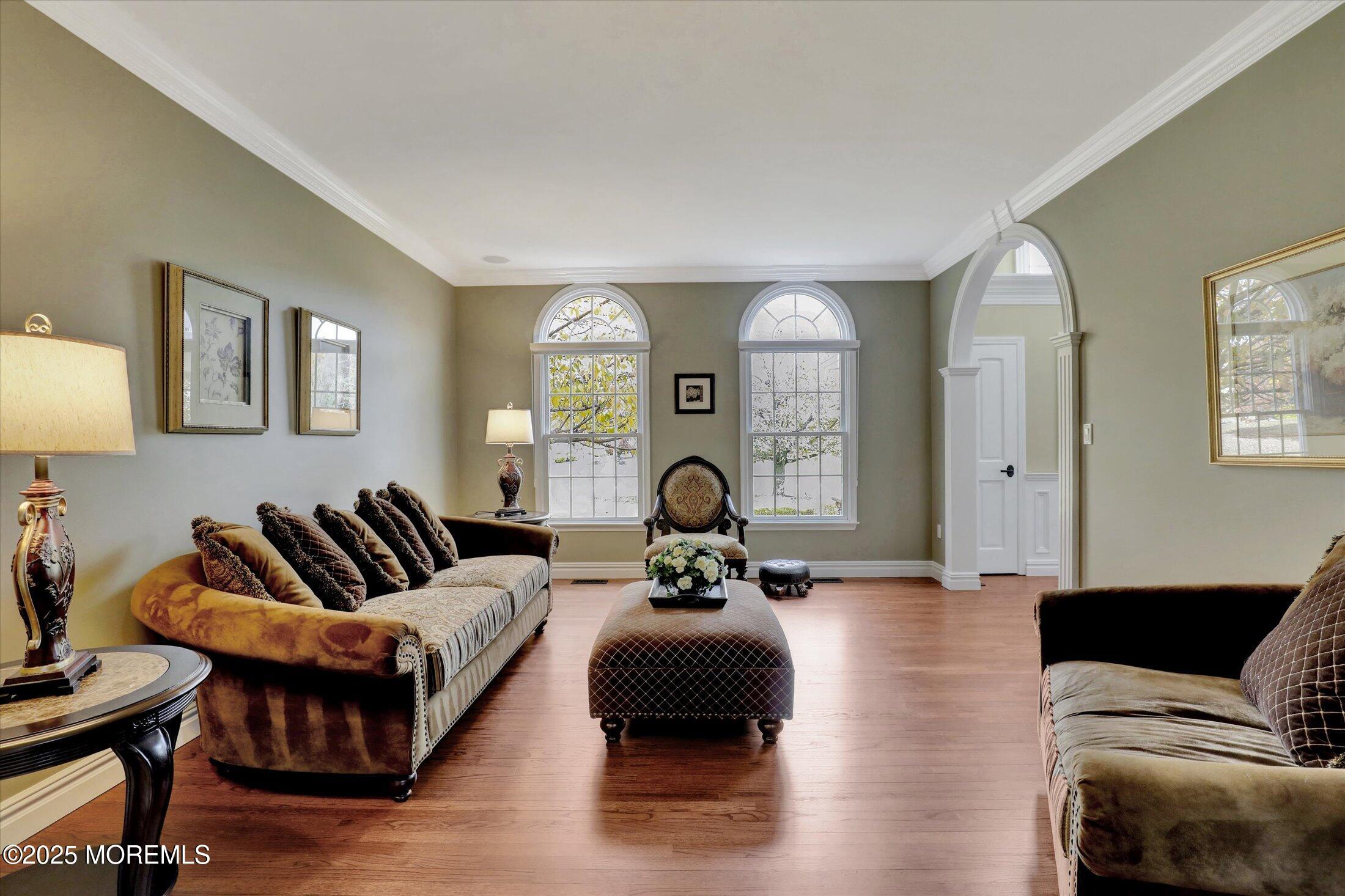 10 Yellow Brook Road Holmdel, NJ 07733 - Photo 21 of 64 a living room with furniture a couch and a potted plant