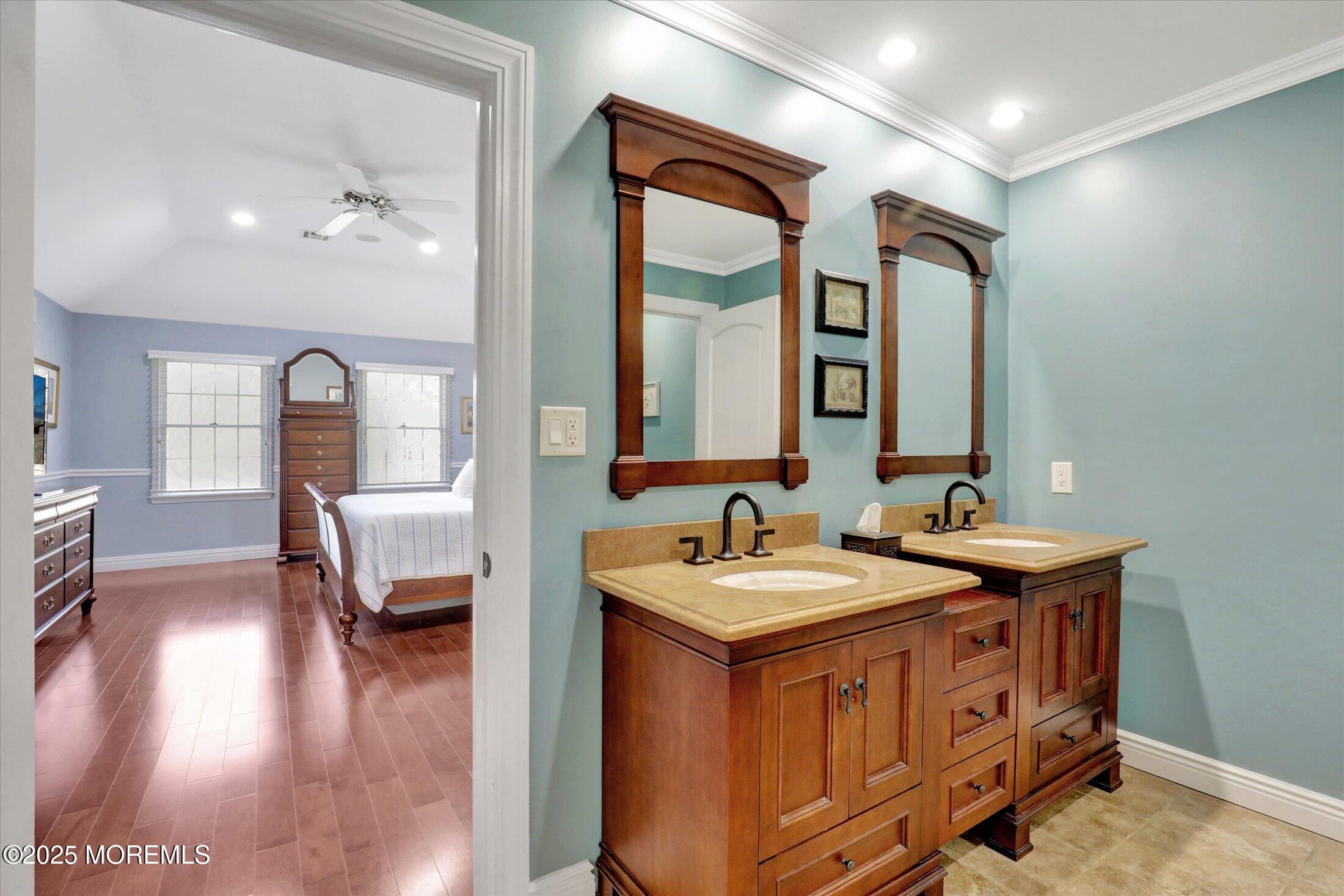 10 Yellow Brook Road Holmdel, NJ 07733 - Photo 30 of 64 a en suite bathroom with double vanity and a mirror