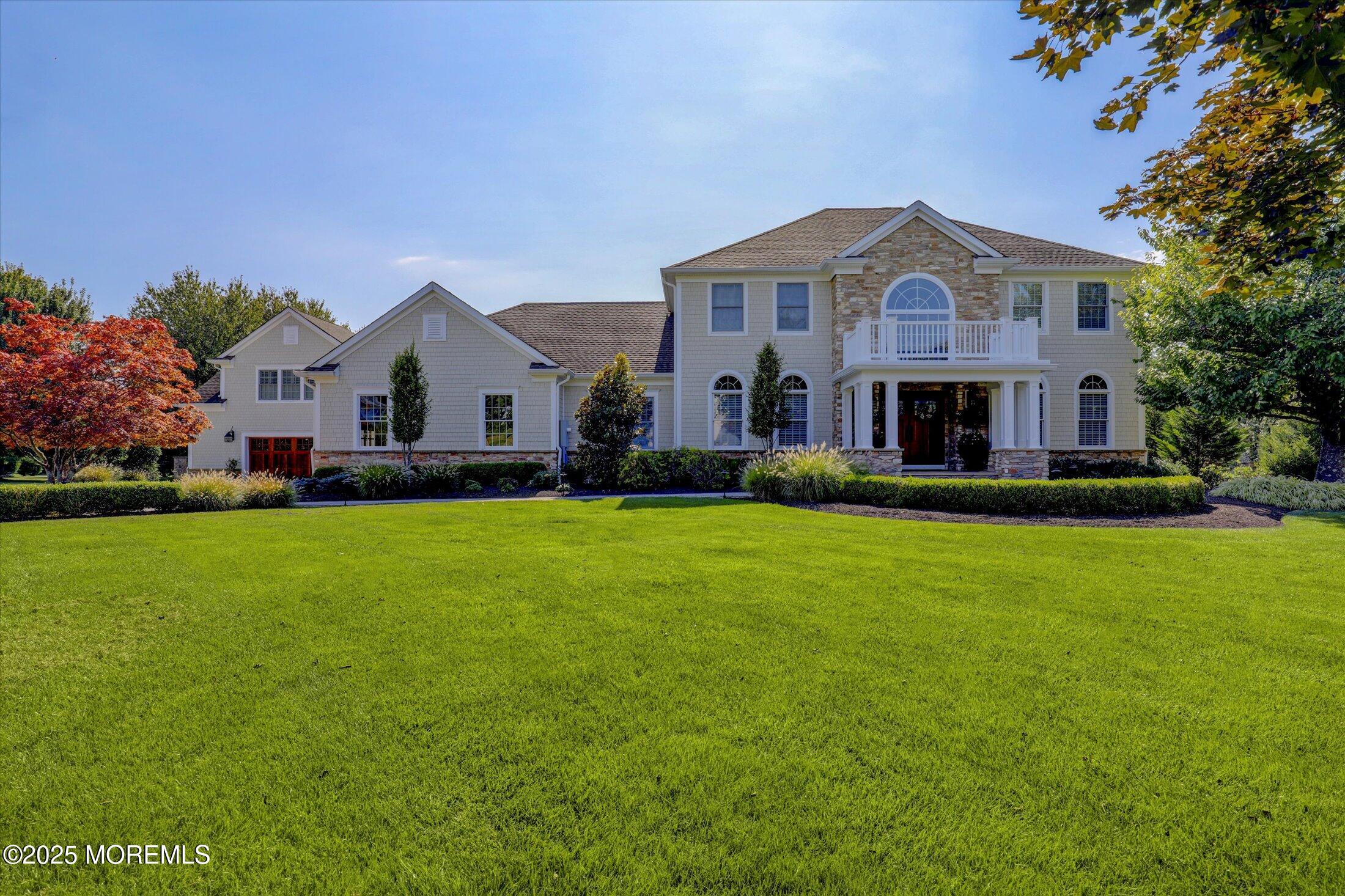 10 Yellow Brook Road Holmdel, NJ 07733 - Photo 4 of 64 a front view of house with yard and green space