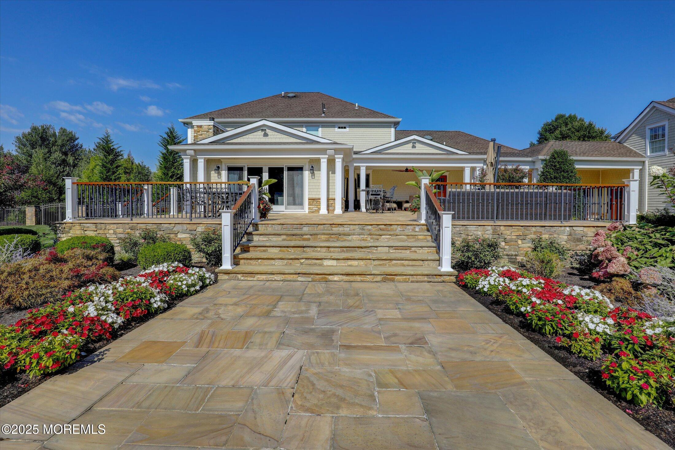 10 Yellow Brook Road Holmdel, NJ 07733 - Photo 48 of 64 a front view of a house with a yard