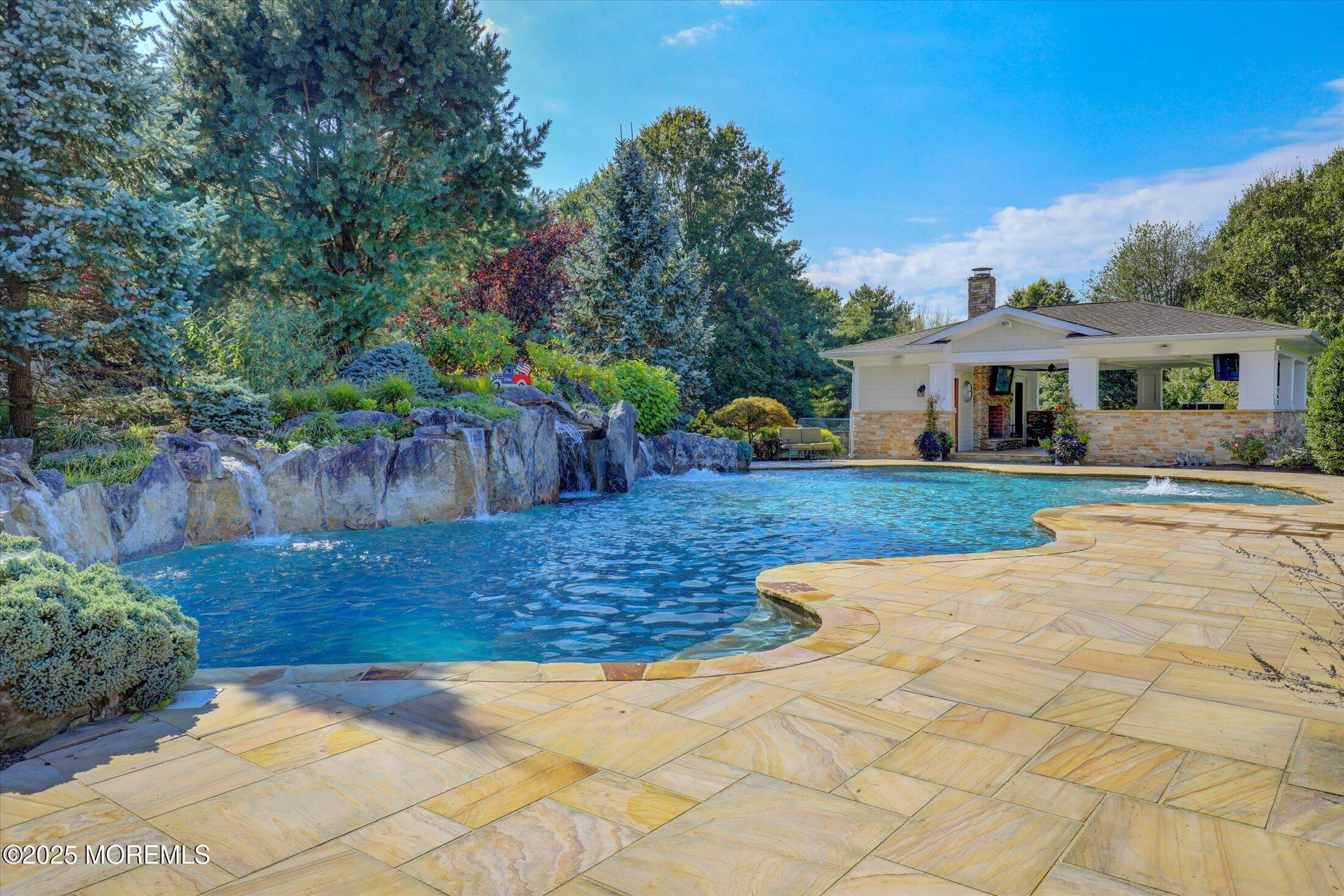 10 Yellow Brook Road Holmdel, NJ 07733 - Photo 52 of 64 a view of a house with backyard and sitting area