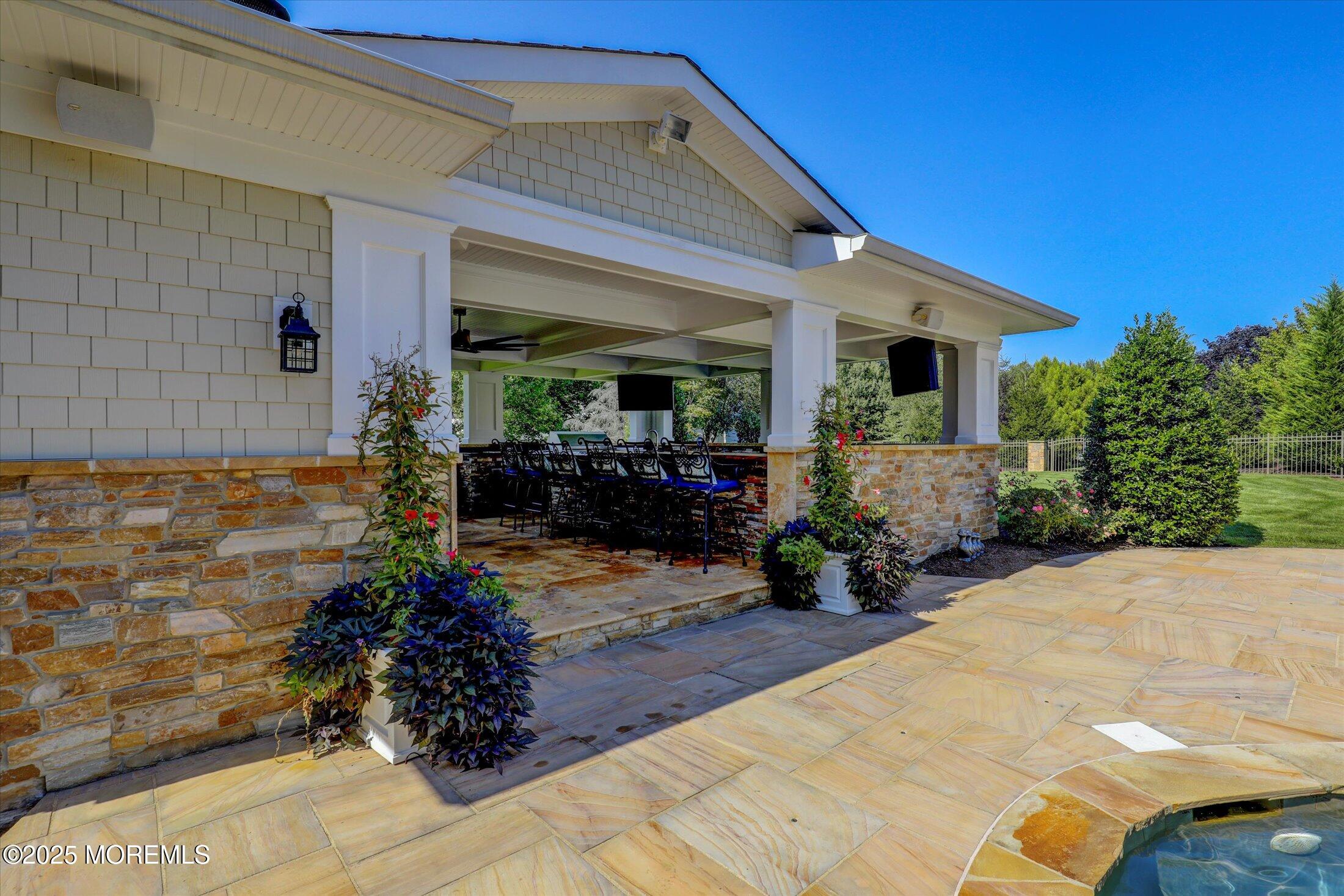 10 Yellow Brook Road Holmdel, NJ 07733 - Photo 55 of 64 a front view of a house with garden