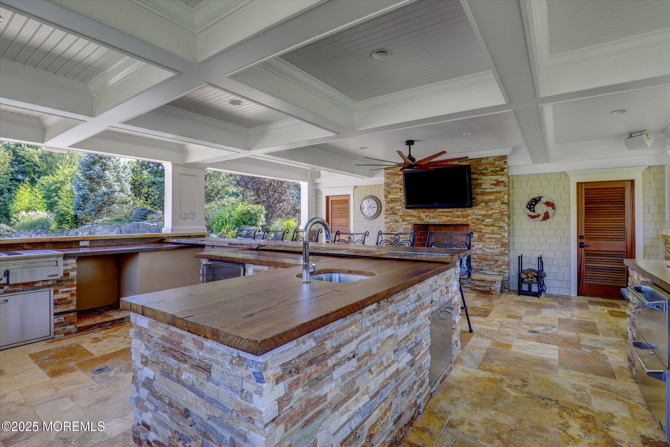 10 Yellow Brook Road Holmdel, NJ 07733 - Photo 57 of 64 a kitchen with stainless steel appliances granite countertop a sink a counter top space and living room view