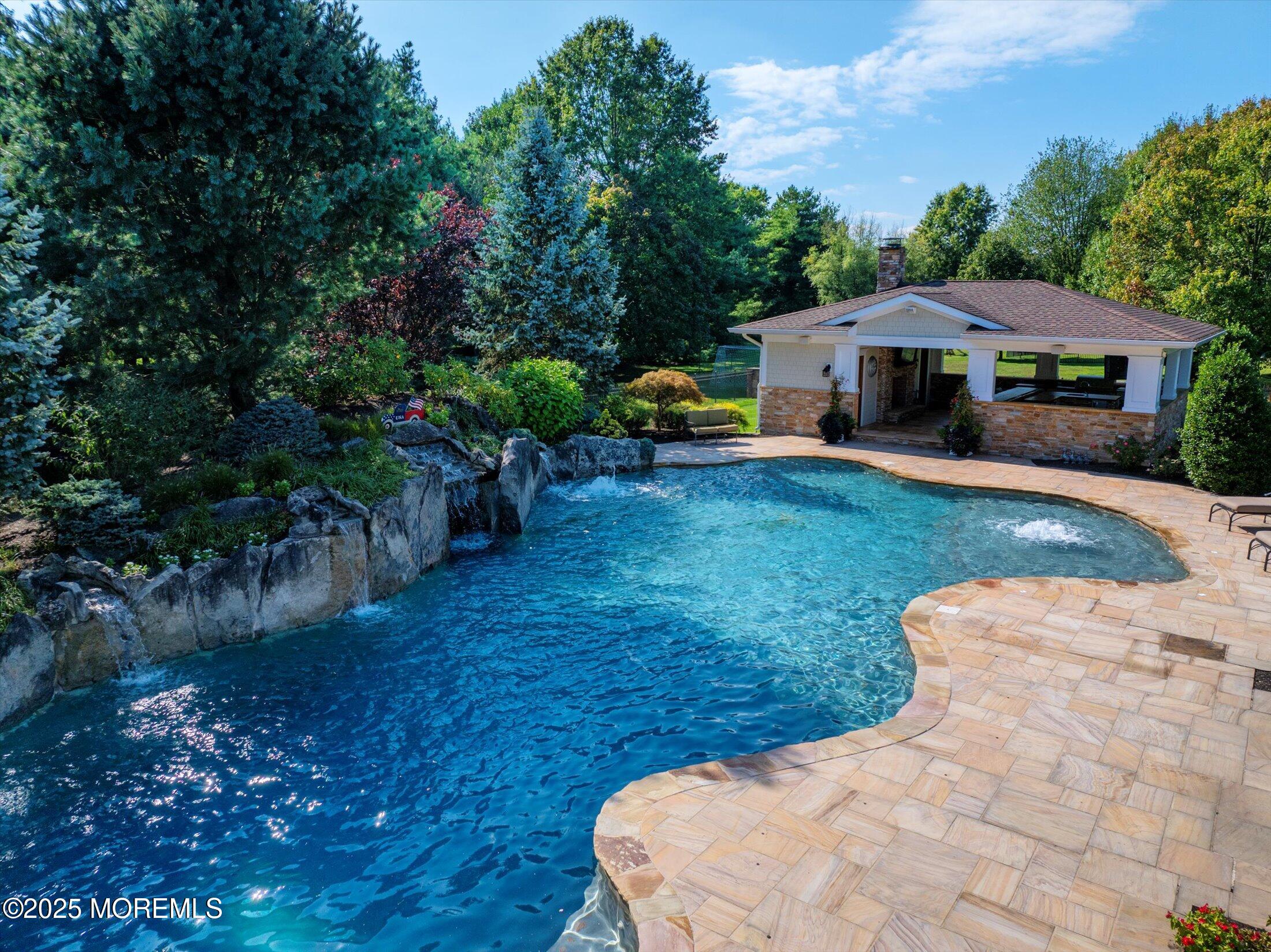10 Yellow Brook Road Holmdel, NJ 07733 - Photo 60 of 64 a view of a house with backyard and sitting area