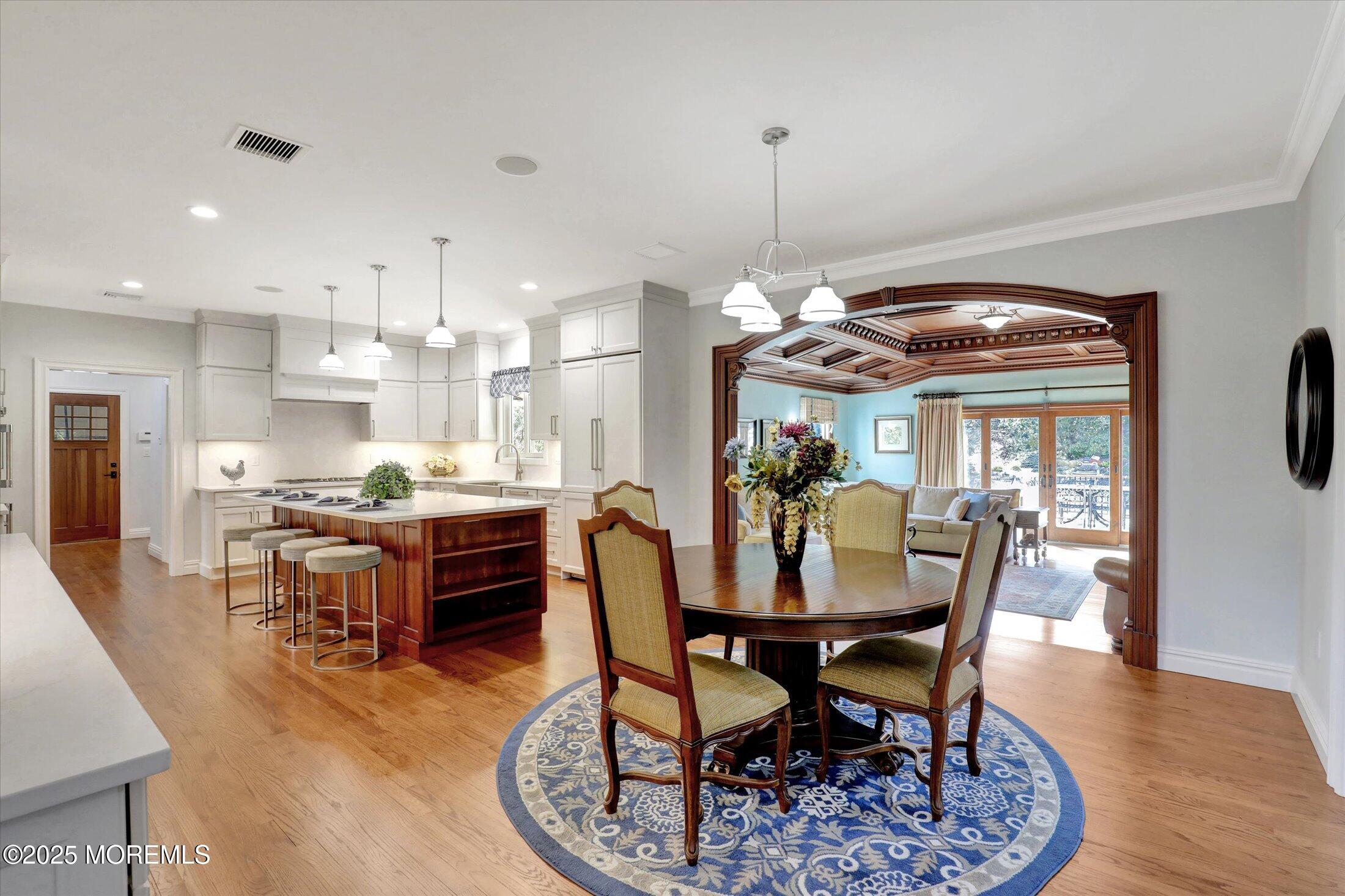 10 Yellow Brook Road Holmdel, NJ 07733 - Photo 8 of 64 a dining room with furniture a chandelier and wooden floor