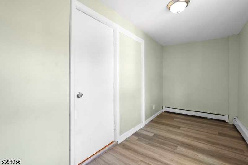 406 South 15th Street Newark, NJ 07103 - Photo 18 of 32 a view of a room with wooden floor
