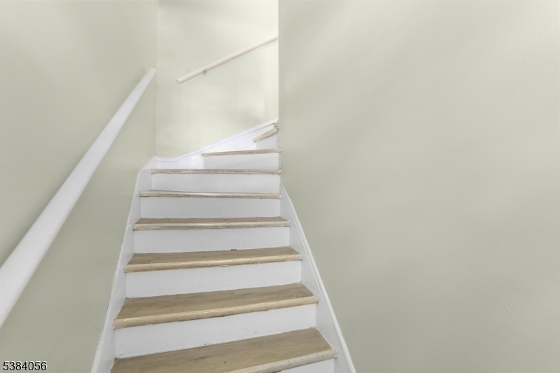 406 South 15th Street Newark, NJ 07103 - Photo 28 of 32 a view of staircase with white walls