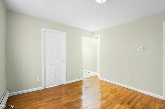 a kitchen with a stove and a refrigerator