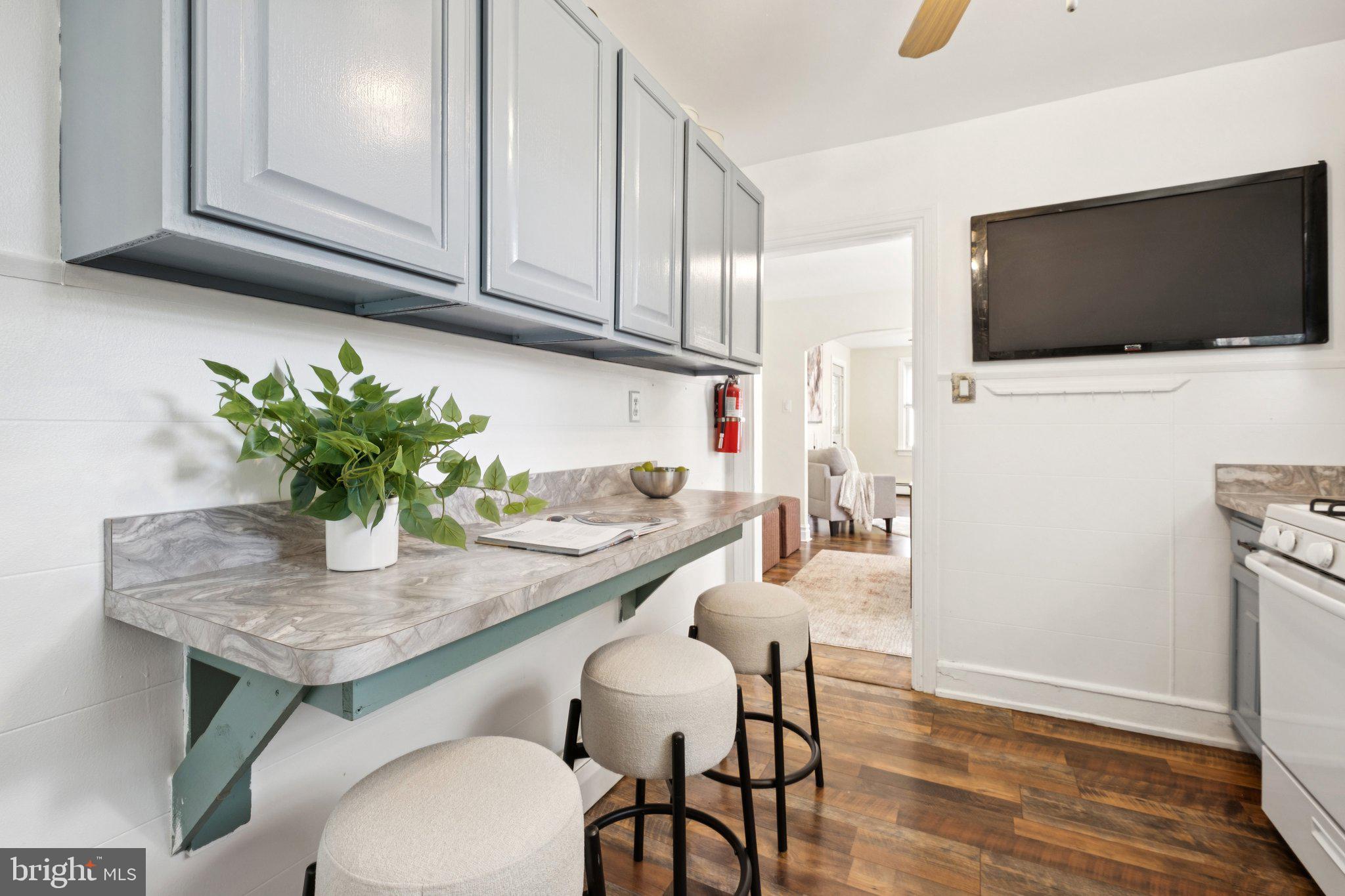20 West Forestview Road Brookhaven, PA 19015 - Photo 14 of 34 a dining room with furniture and wooden floor