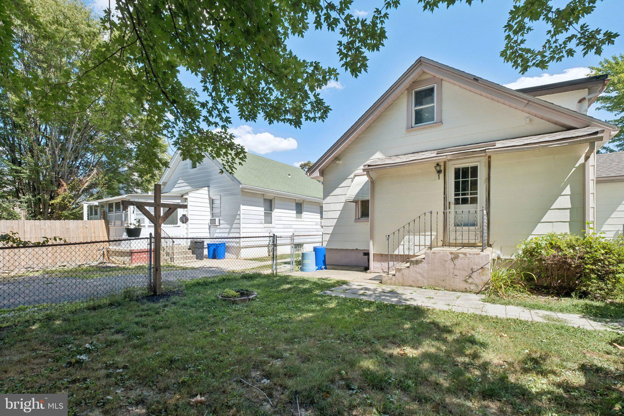 20 West Forestview Road Brookhaven, PA 19015 - Photo 34 of 34 a front view of house with yard and green space
