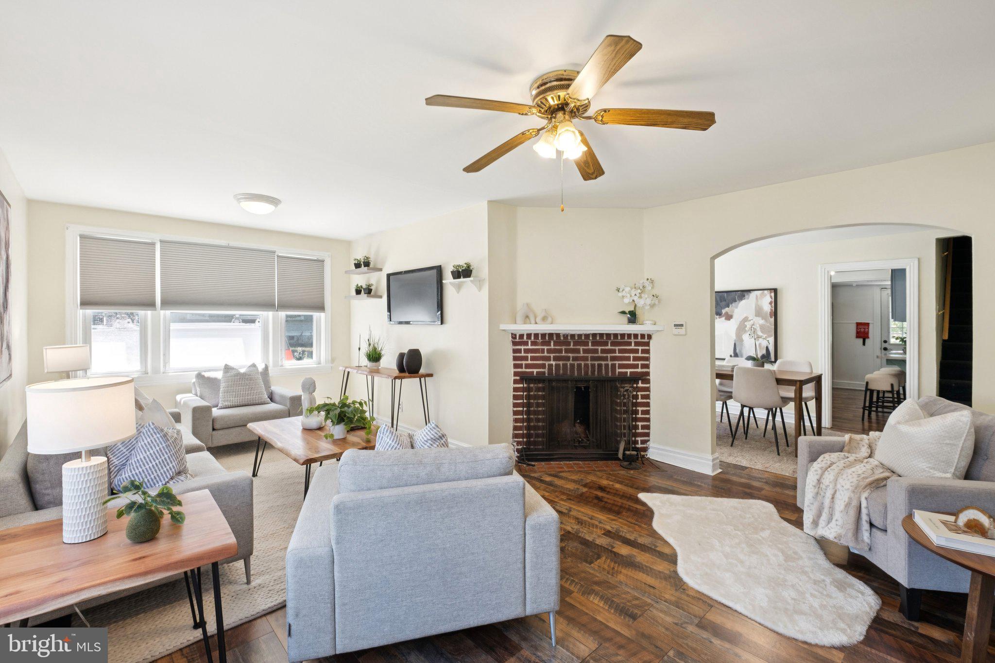 20 West Forestview Road Brookhaven, PA 19015 - Photo 5 of 34 a living room with furniture and a fireplace