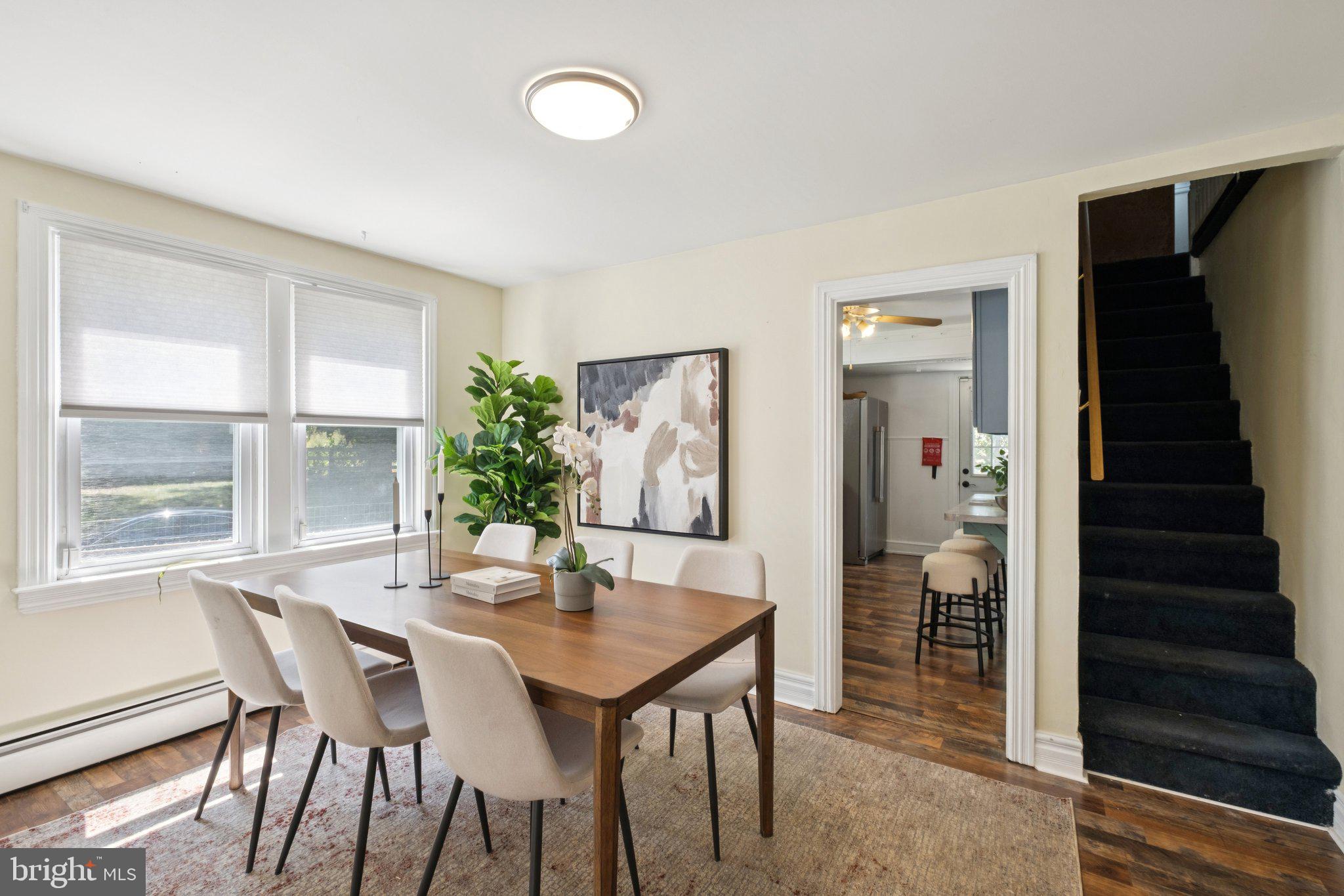 20 West Forestview Road Brookhaven, PA 19015 - Photo 9 of 34 a view of a dining room with furniture and wooden floor