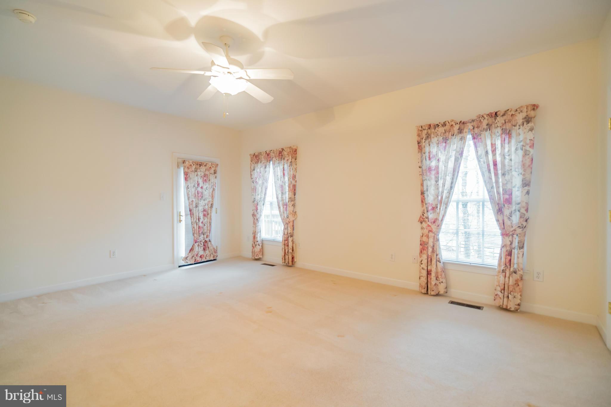 9504 Emory Grove Road Gaithersburg, MD 20877 - Photo 15 of 30 a view of an empty room with a window