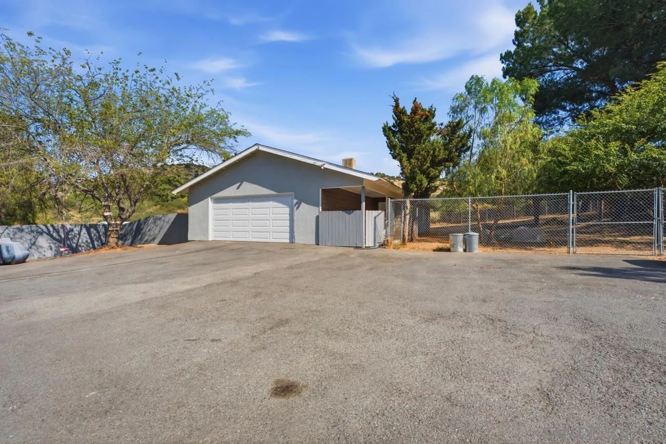 15773 Oak Valley Road Ramona, CA 92065 - Photo 11 of 42 Parking, garage, and entrance to house.