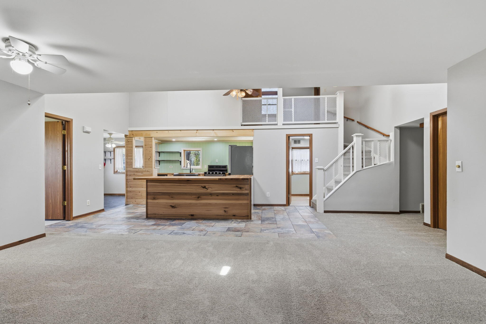 28711 Silver Lake Road Salem Lakes, WI 53168 - Photo 8 of 38 Great room looking to kitchen and loft
