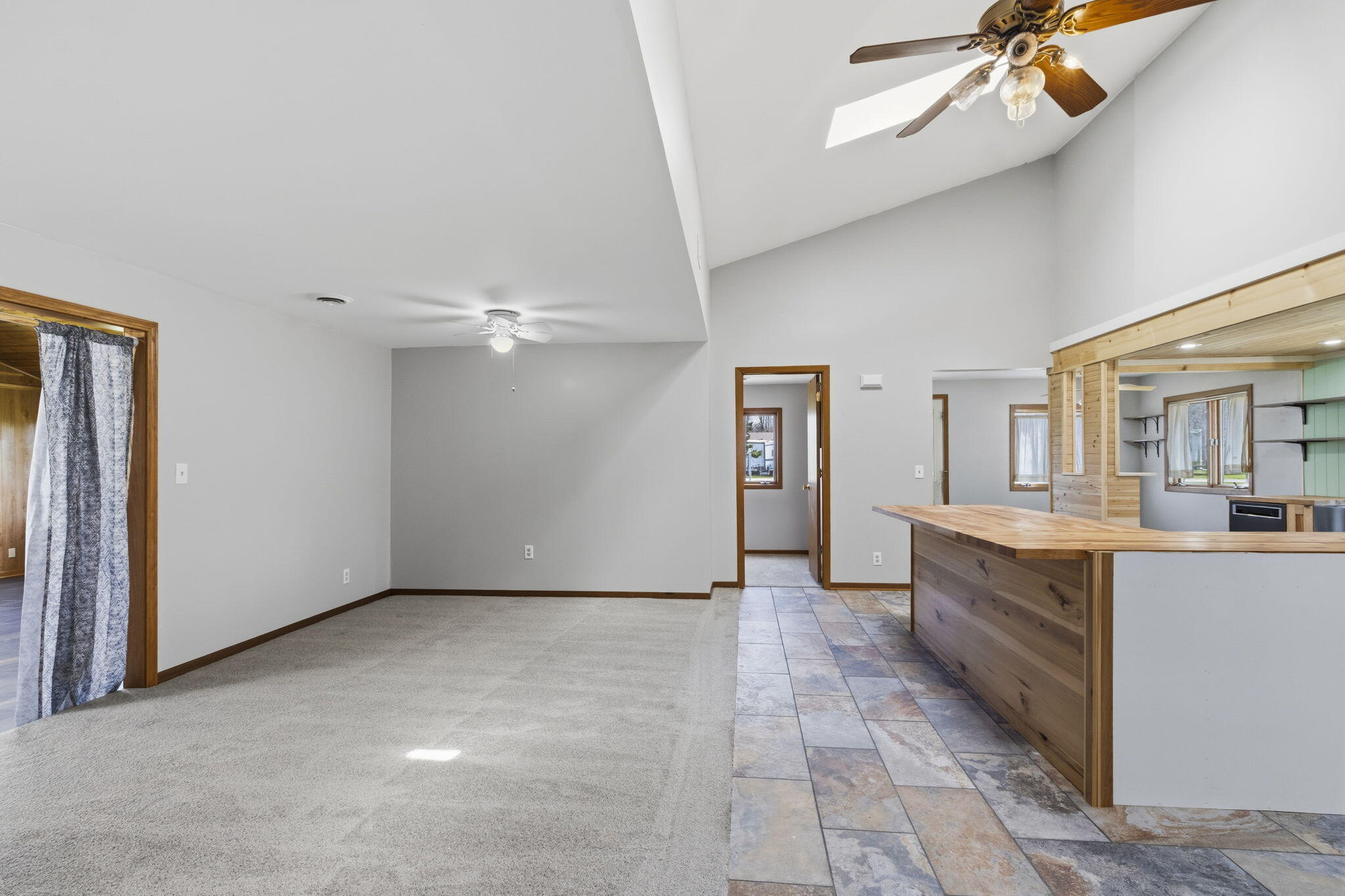 28711 Silver Lake Road Salem Lakes, WI 53168 - Photo 9 of 38 Great room looking to the kitchen & front door
