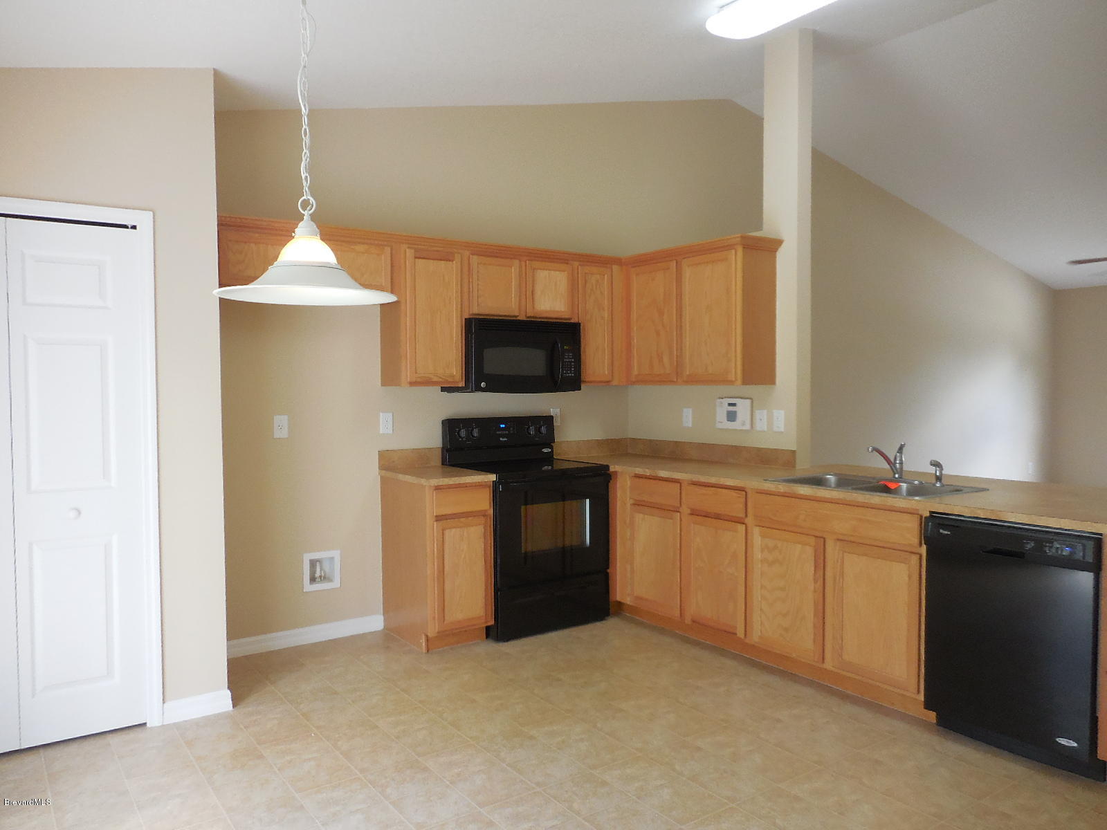 455 Wayland Road Southwest Palm Bay, FL 32908 - Photo 5 of 16 kitchen and dining
