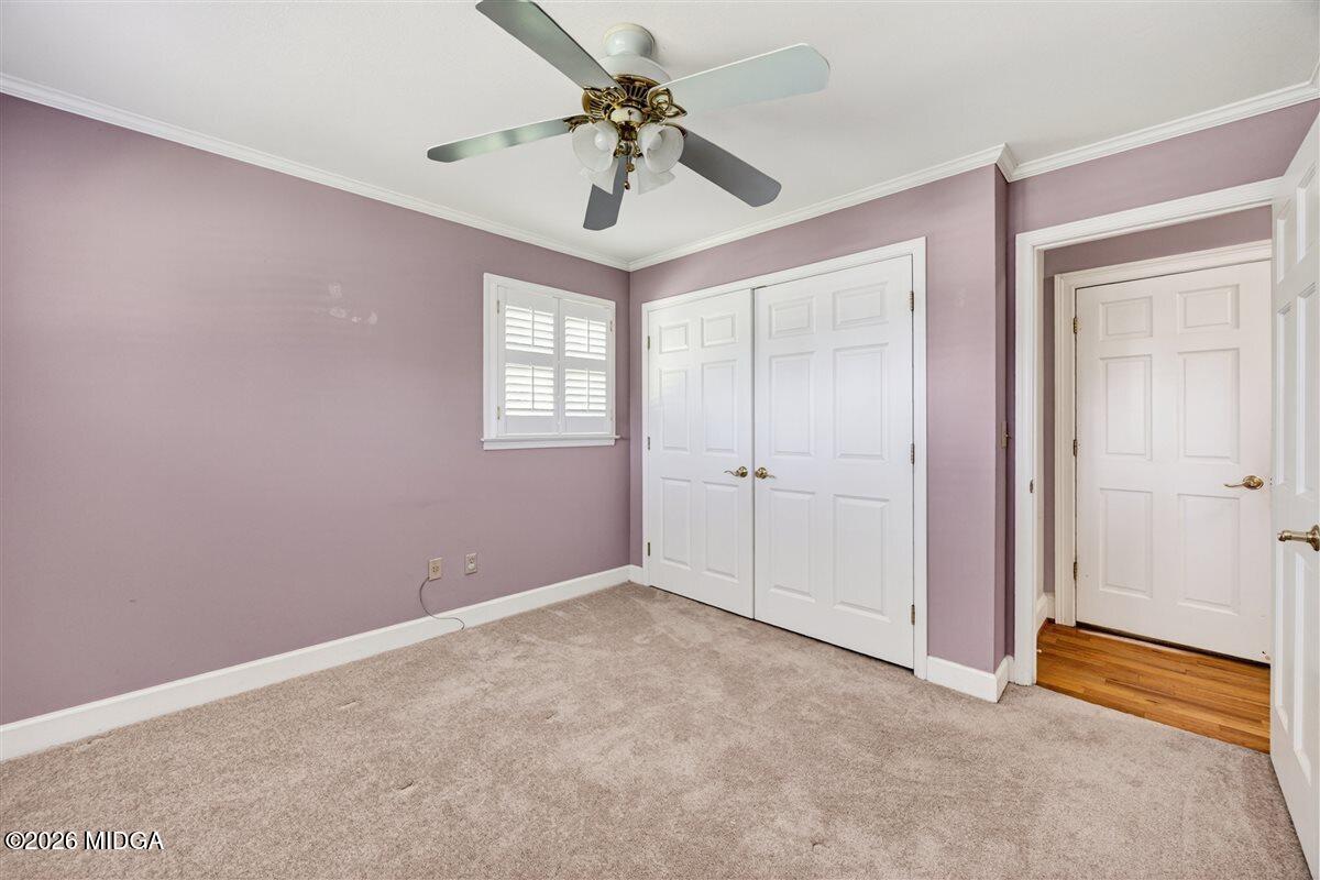 335 Hamrick Road Macon, GA 31220 - Photo 23 of 41 an empty room with windows and fan