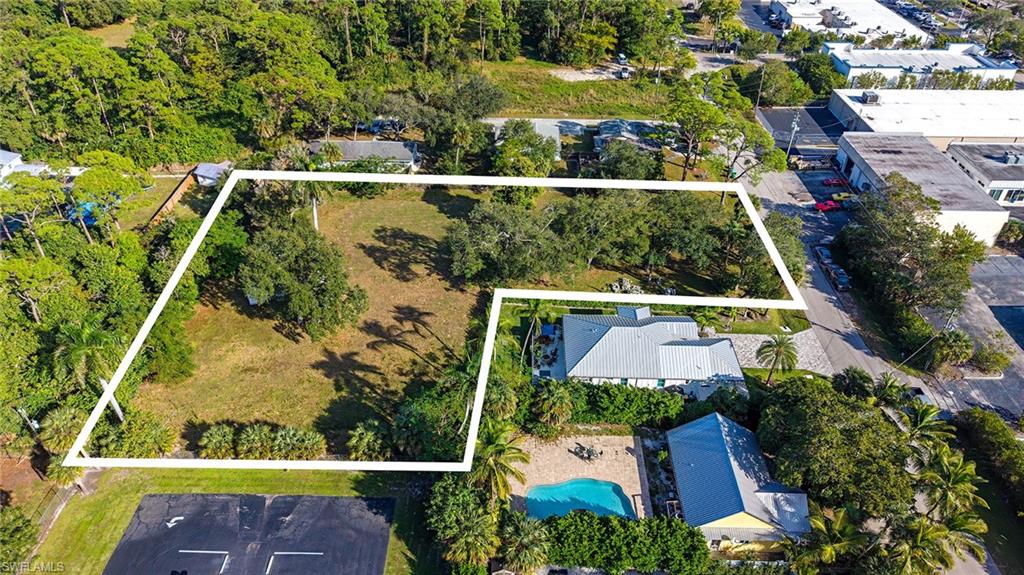 Terrace Avenue Naples, FL 34104 - Photo 2 of 5 an aerial view of house with a yard