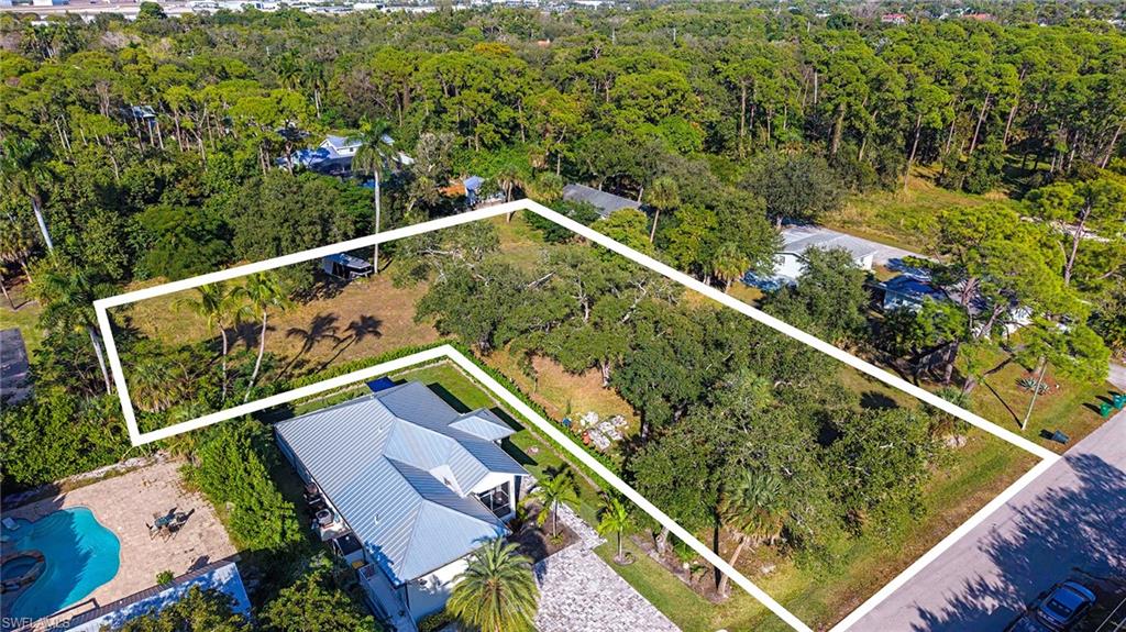 Terrace Avenue Naples, FL 34104 - Photo 5 of 5 a view of a balcony with two chairs