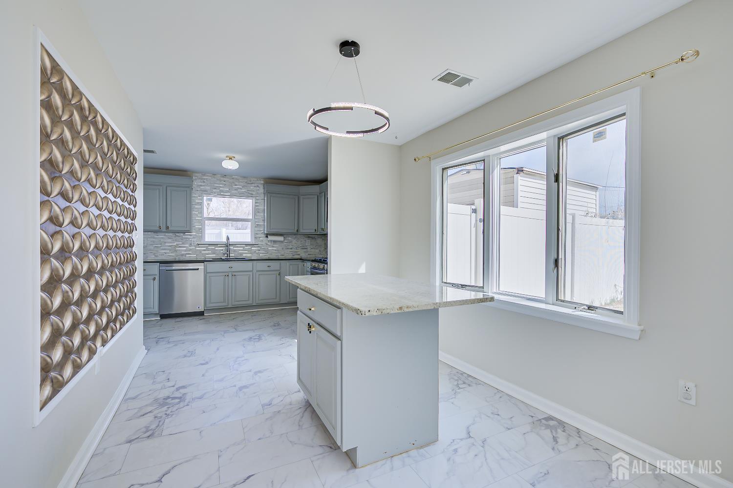 17 Idlewild Road Edison, NJ 08817 - Photo 20 of 36 a kitchen with stainless steel appliances granite countertop a sink and a stove