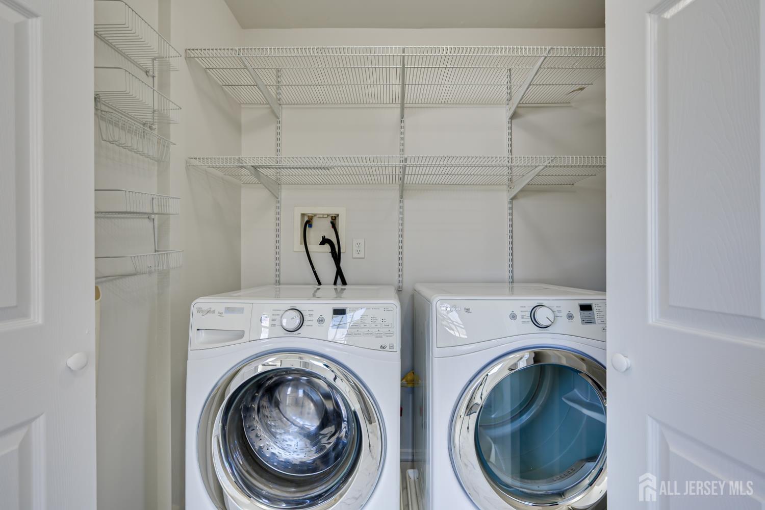 17 Idlewild Road Edison, NJ 08817 - Photo 33 of 36 a utility room with dryer and washer