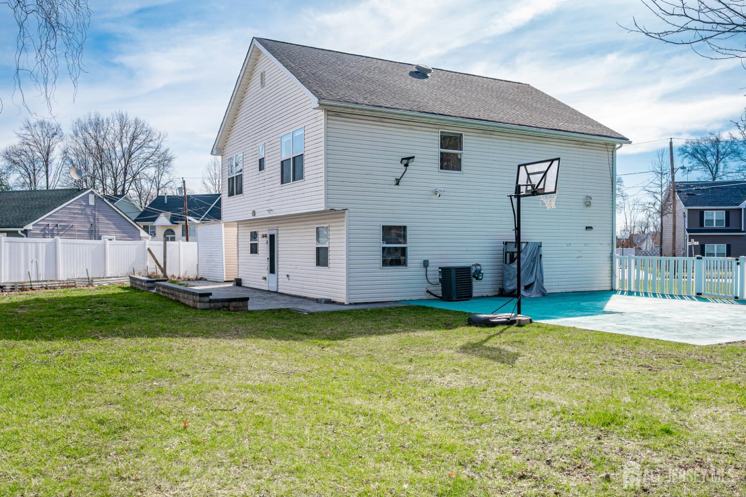 17 Idlewild Road Edison, NJ 08817 - Photo 34 of 36 a view of a house with backyard and sitting area